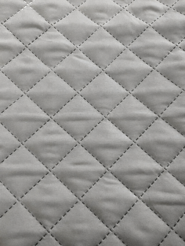 Detalle Cubre Colchón Ajustable 2.0 Plazas MF/TNT 90G Gris